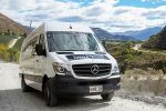 Enjoy a glass of red wine on the Queenstown Wine Trail